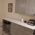 Modern kitchen with a breakfast bar and high chairs