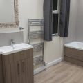 Heated towel rail next to the sink