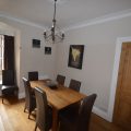 Dining room with a large table and chairs
