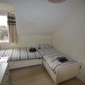 Two single beds in a bed room