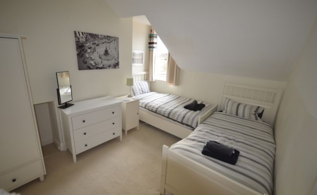 Bedroom with two single beds