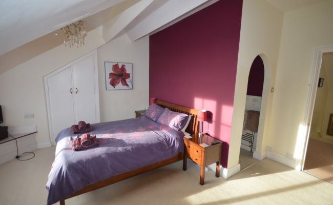 Master bedroom. Contains a double bed and an ensuite