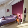 Bedroom with king sized bed and ensuite.